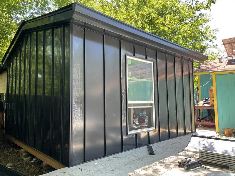 Black standing seam metal wall panels for Metal Roof Installation in Derby